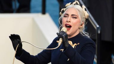 Lady Gaga sings the national anthem during Joe Biden's inauguration. Pic: AP
